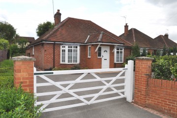 Detached bungalow walk of Farnham town and station